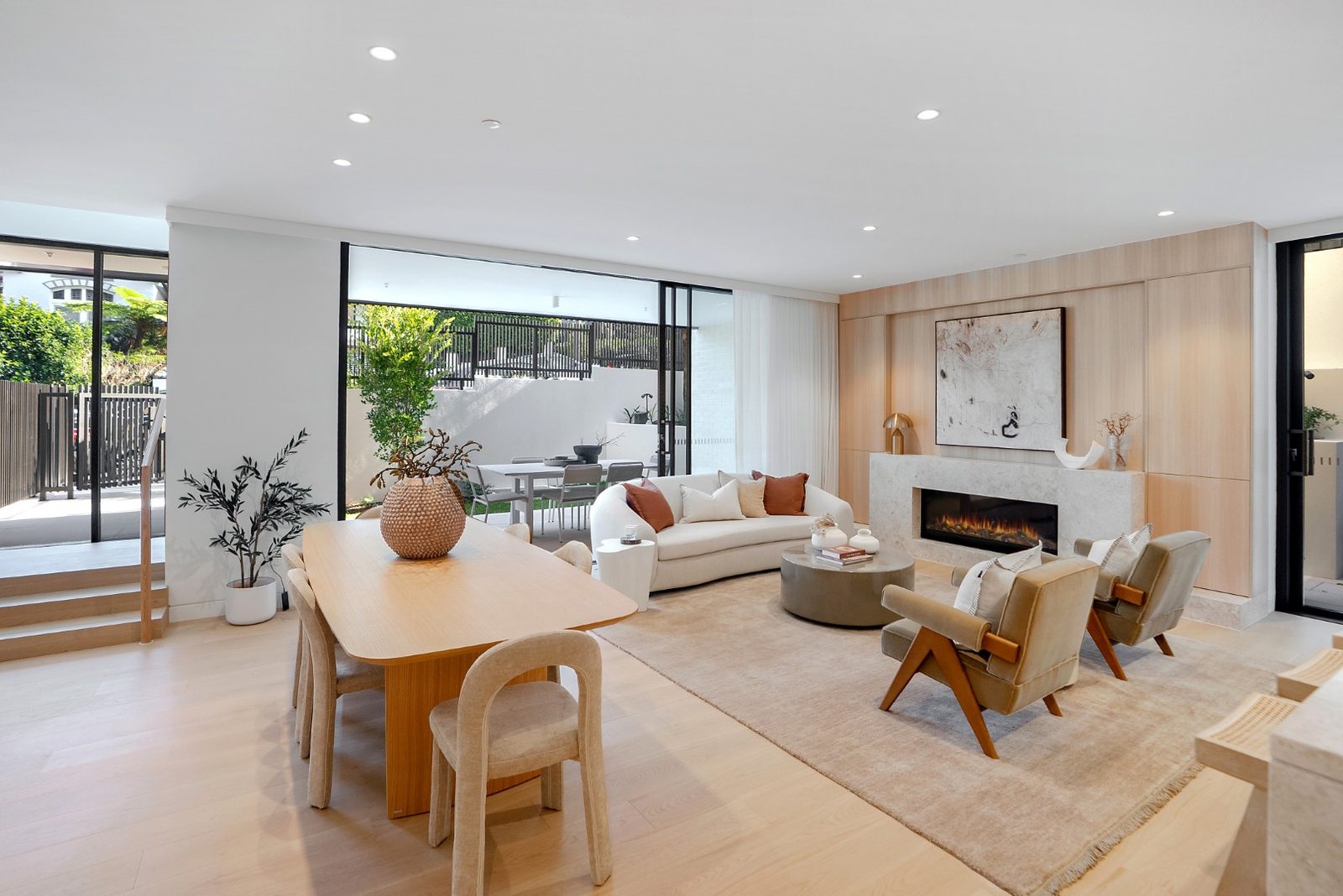 Light-filled living room with designer furnishings