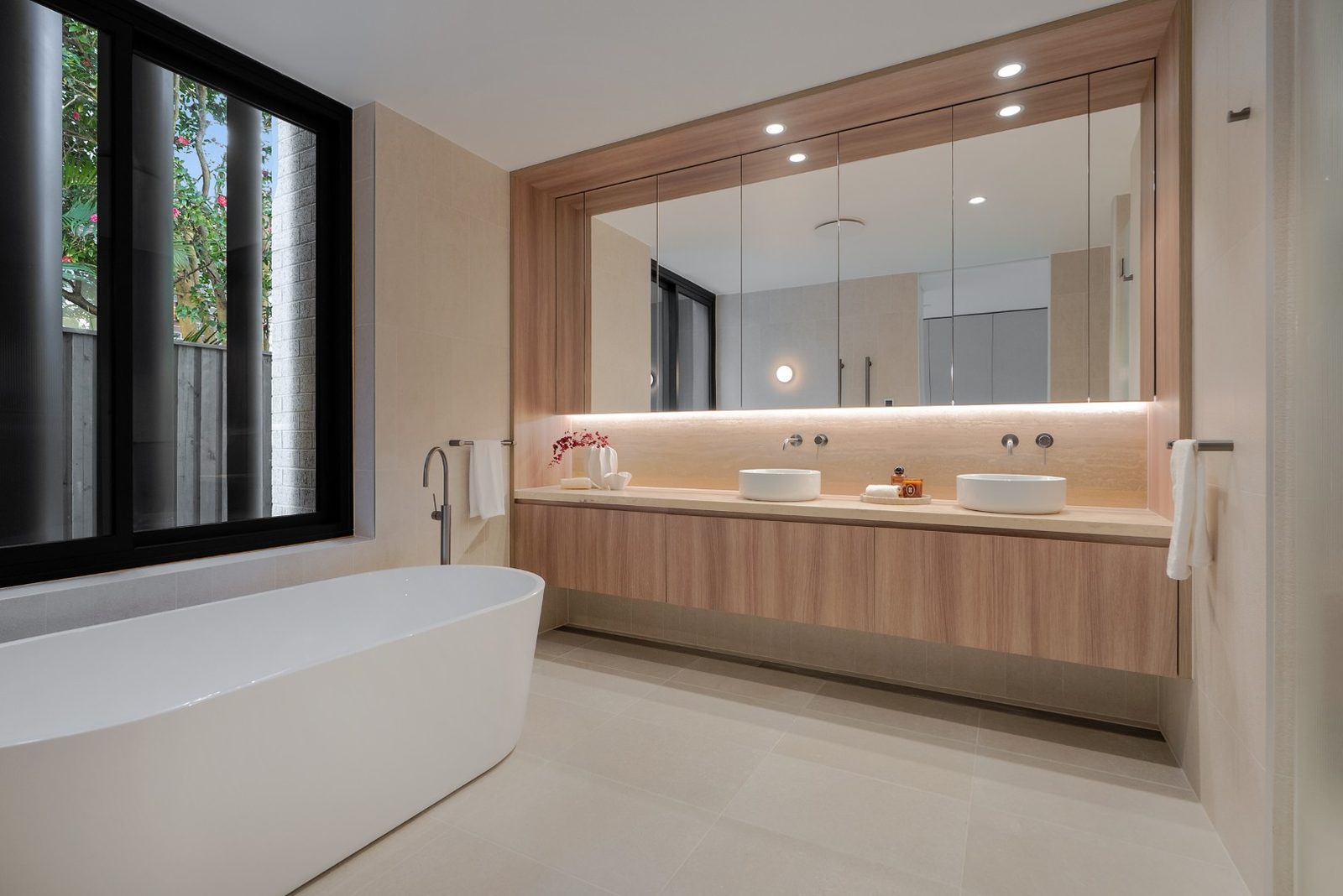 Elegant bathroom with Travertine stone finishes