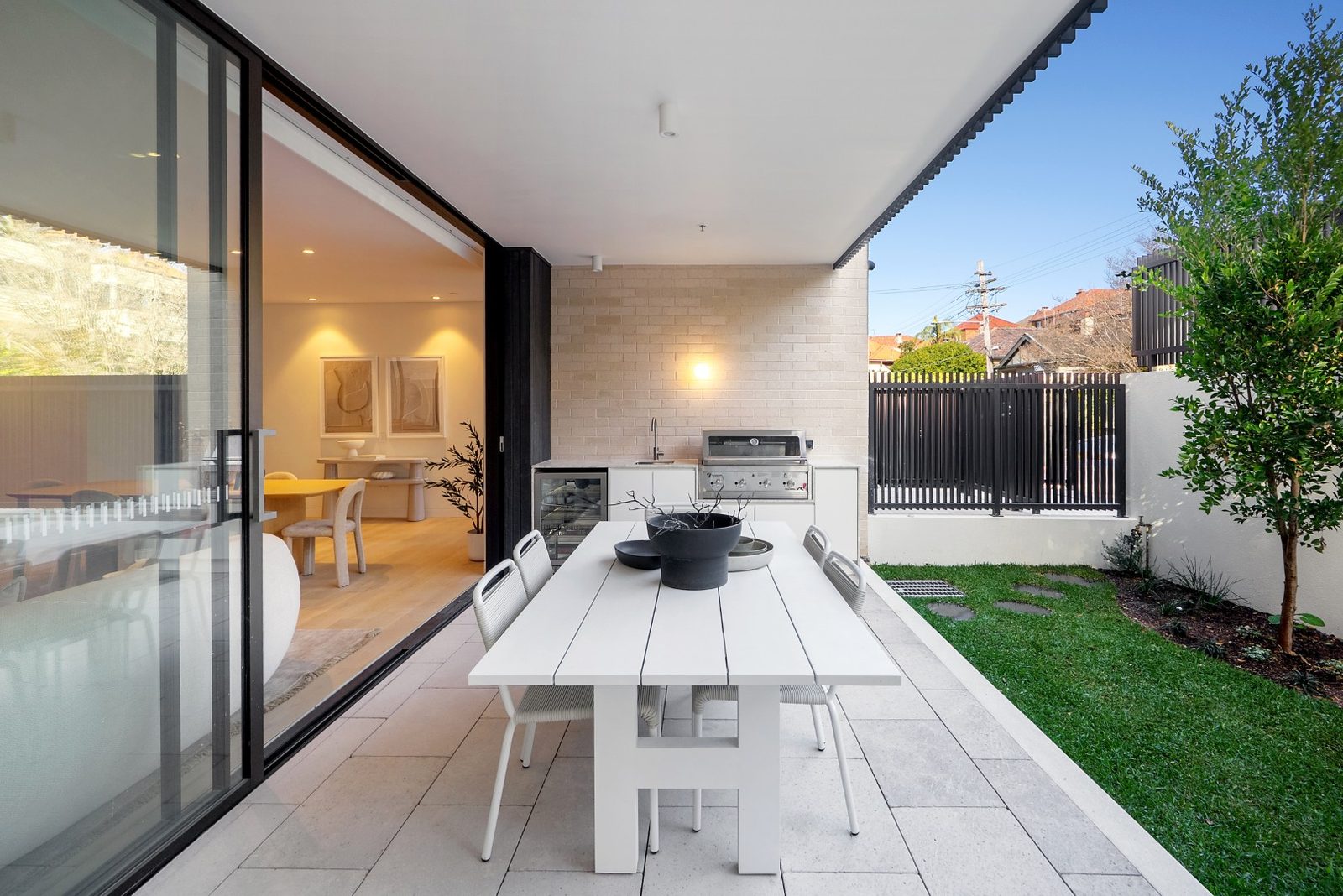 Outdoor terrace with built-in kitchen