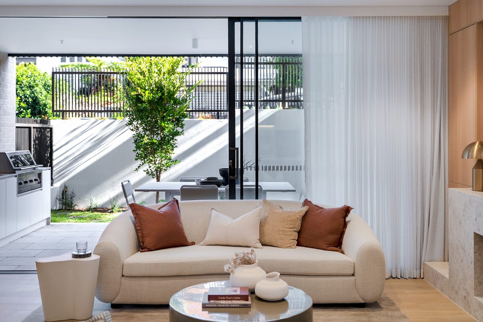 Open-plan living area opening to the courtyard